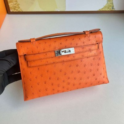 Hermes Kelly Pochette Handmade Bag in Orange Ostrich Leather