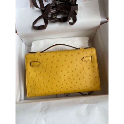 Hermes Kelly Pochette Handmade Bag In Jaune Ambre Ostrich Leather