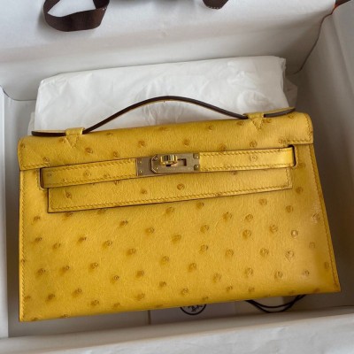 Hermes Kelly Pochette Handmade Bag In Jaune Ambre Ostrich Leather