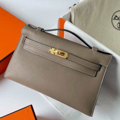 Hermes Kelly Pochette Handmade Bag In Taupe Swift Calfskin